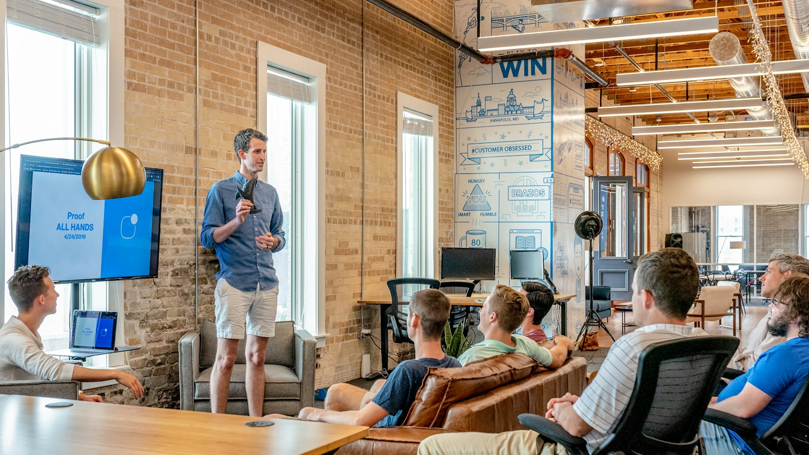 A software team gathered for a planning session in a bright office