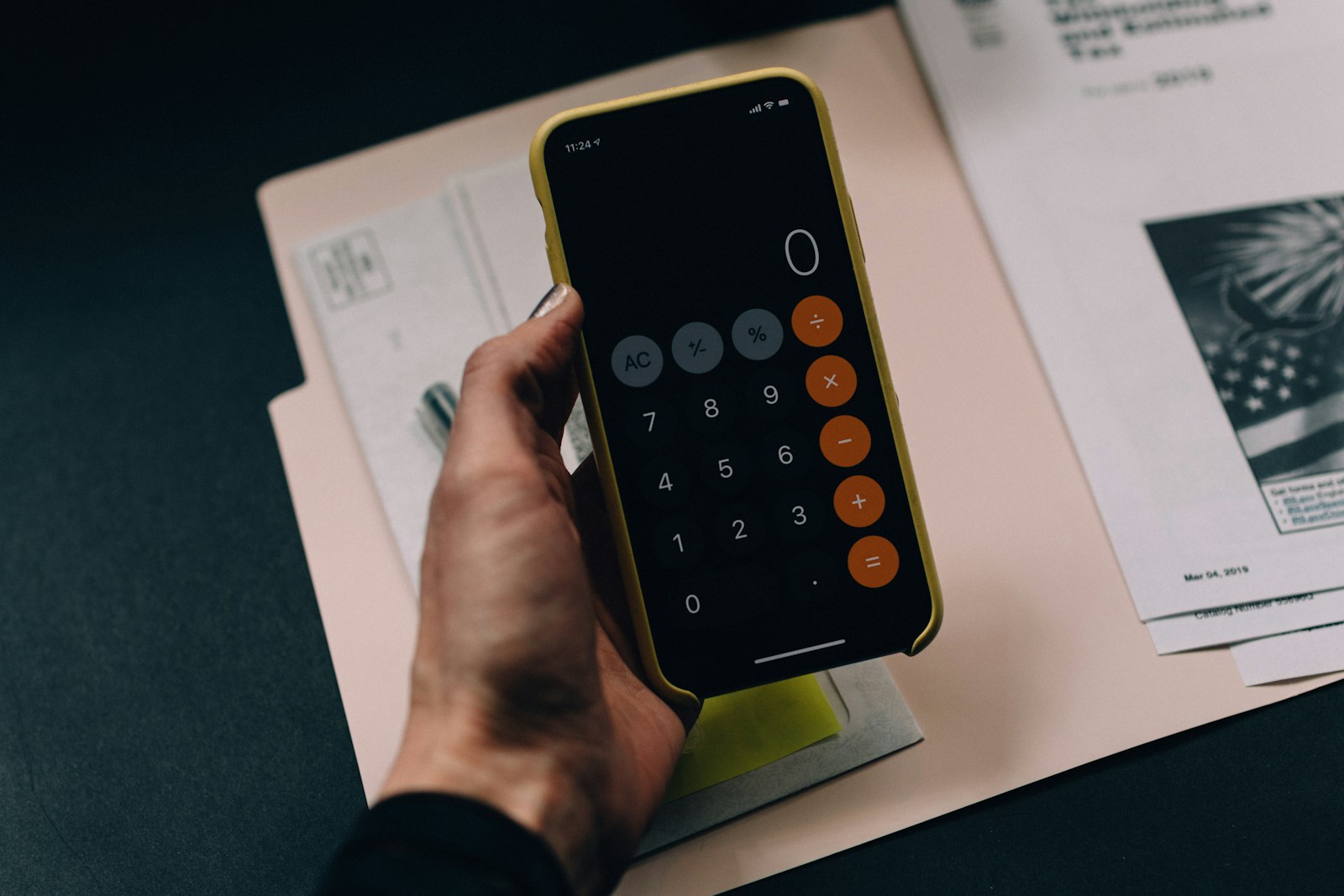 Calculator and financial notes representing AI token costs