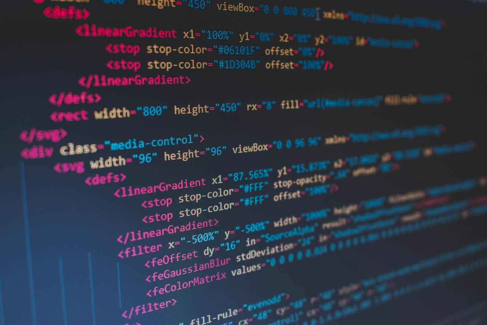 Colorful syntax-highlighted code on a monitor